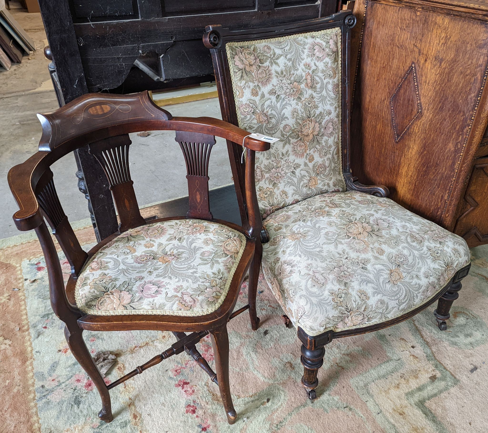 A late Victorian upholstered nursing chair and an Edwardian inlaid mahogany corner elbow chair